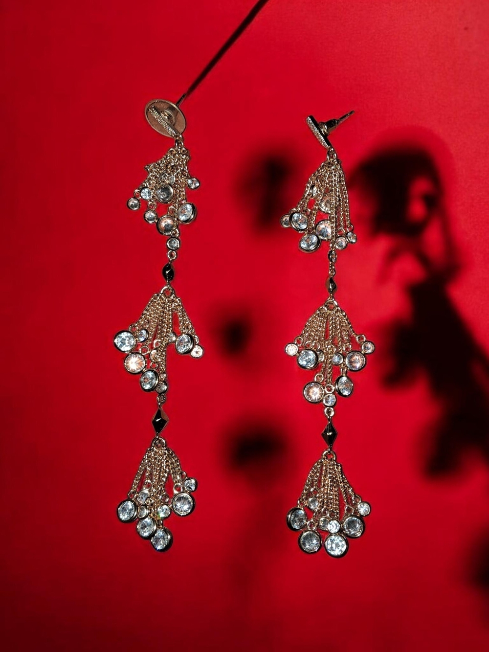 The highlighted item features the Kendra Scott Tallulah Shoulder Duster Earrings